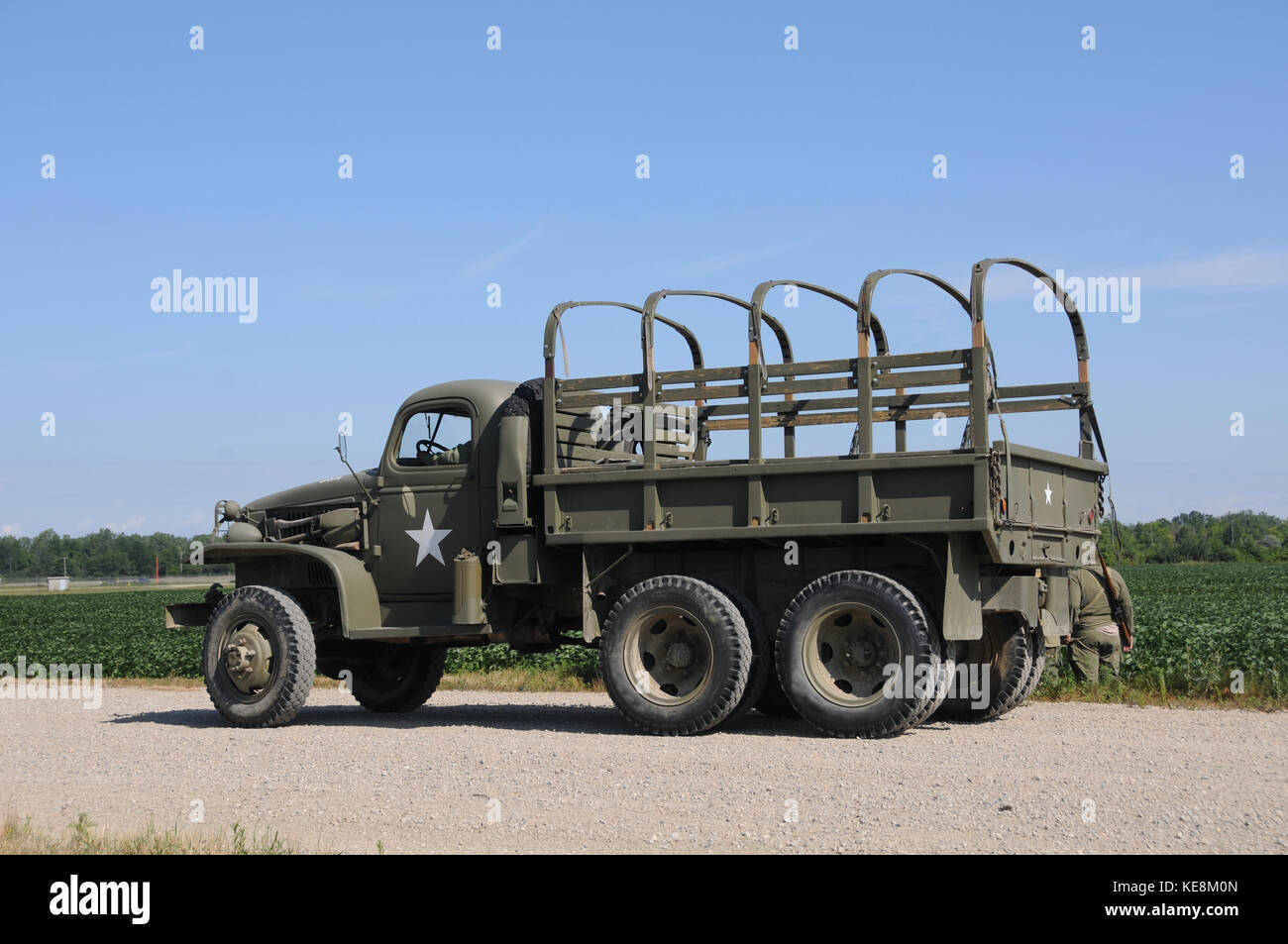 World War II era military truck on a country road Stock Photo