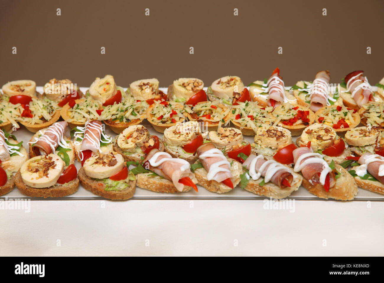 Assortment of delicious canapes on promotion event Stock Photo