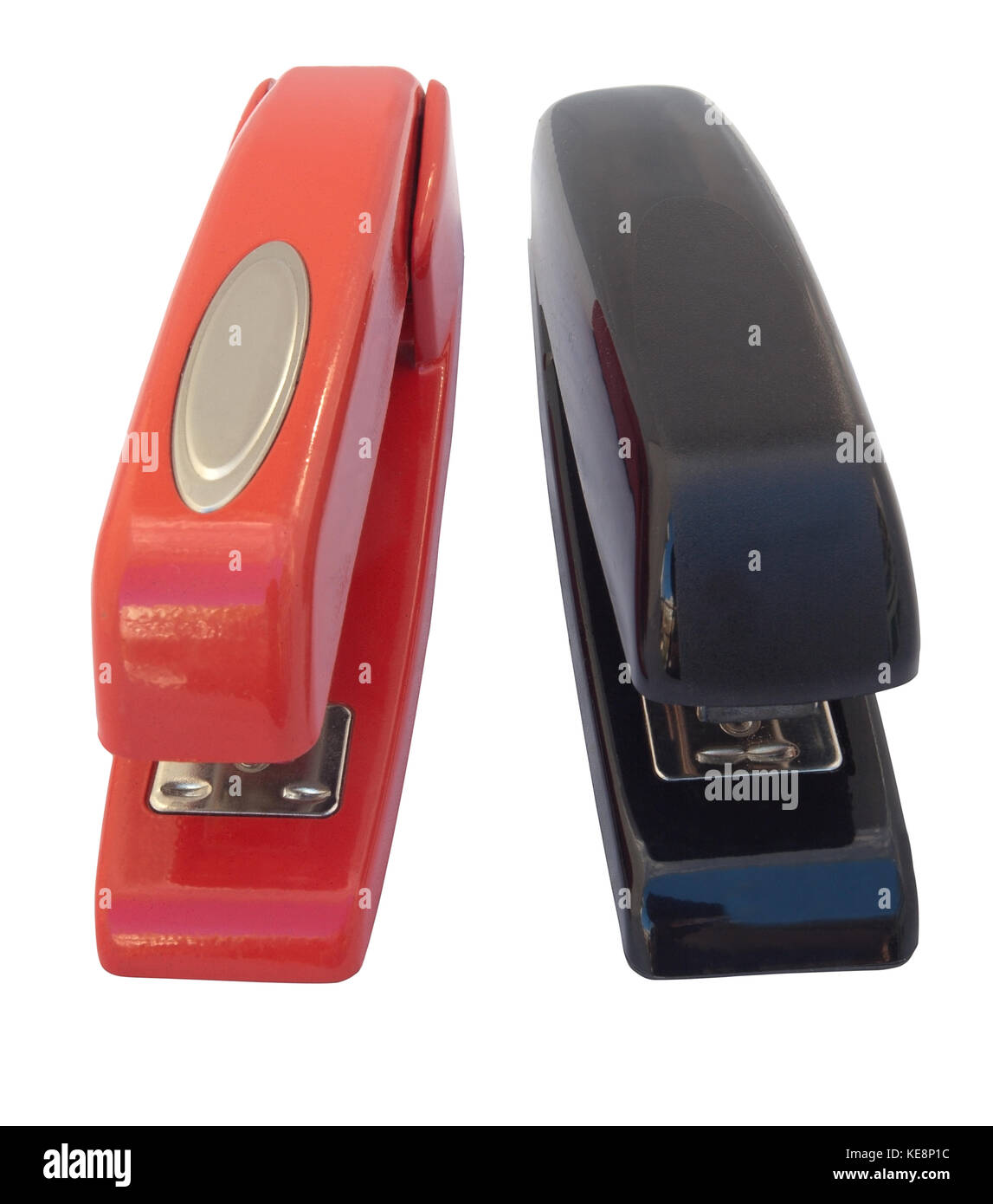 Red and black staplers. Isolated. Stock Photo