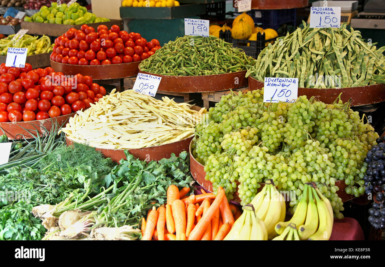 Fresh organic vegetables sold on market stall Stock Photo - Alamy