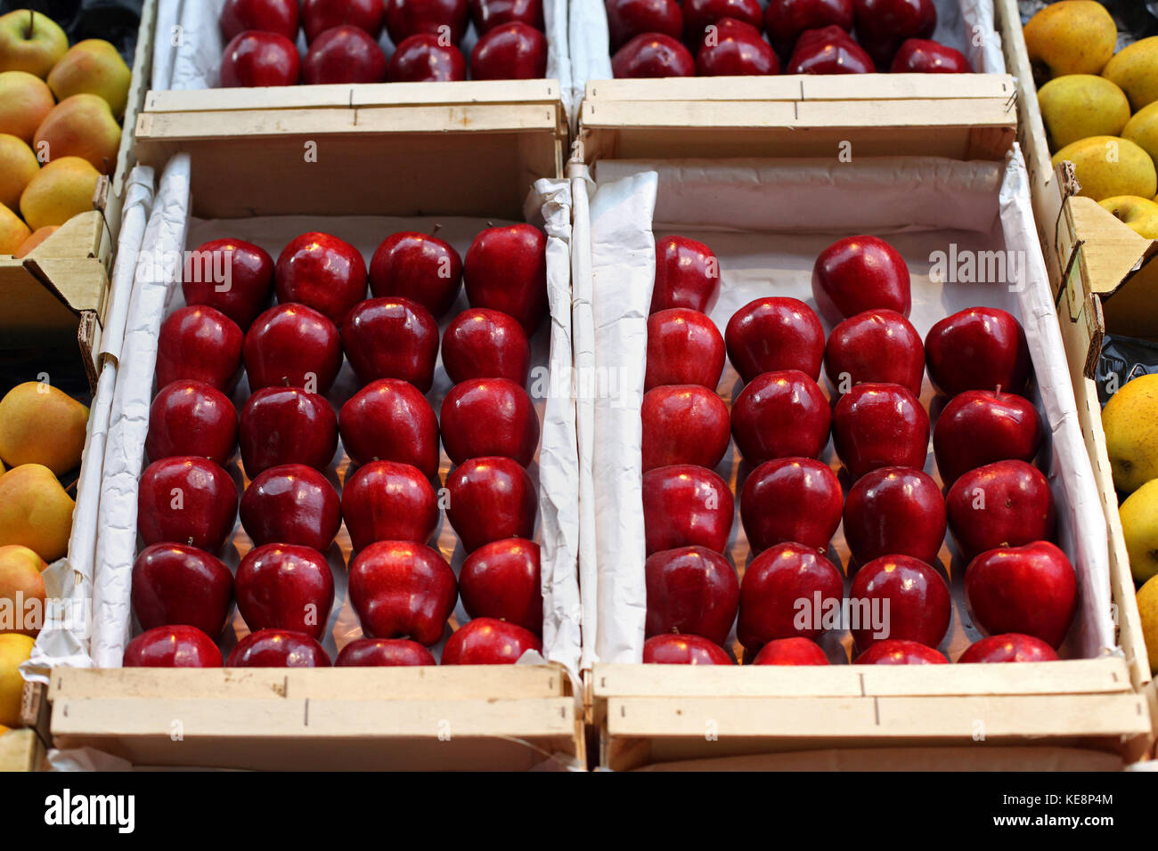 Organic red apples inside wooden crates sold on market Stock Photo - Alamy