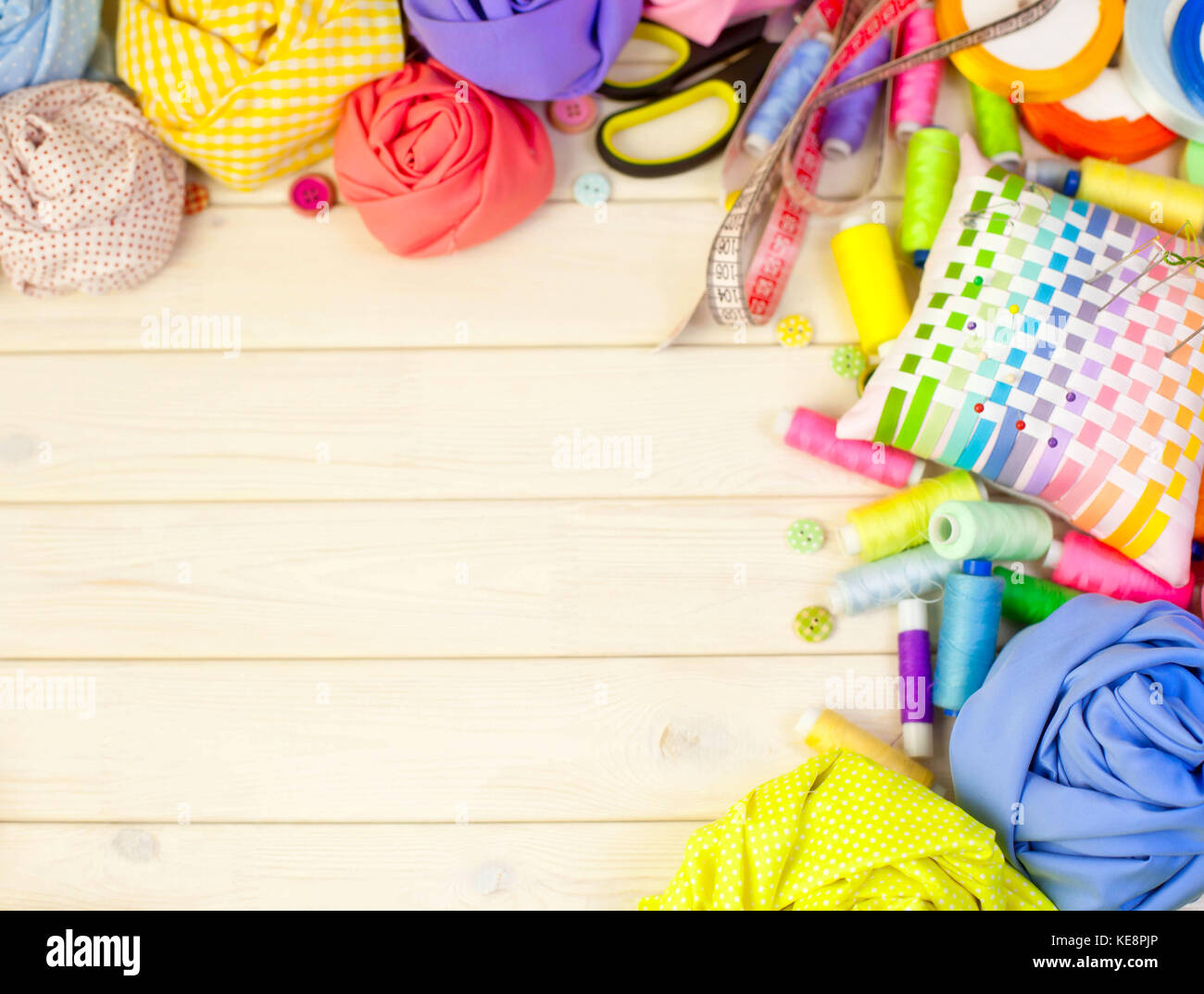 Accessories for sewing lie on a white background. Measuring tape ...