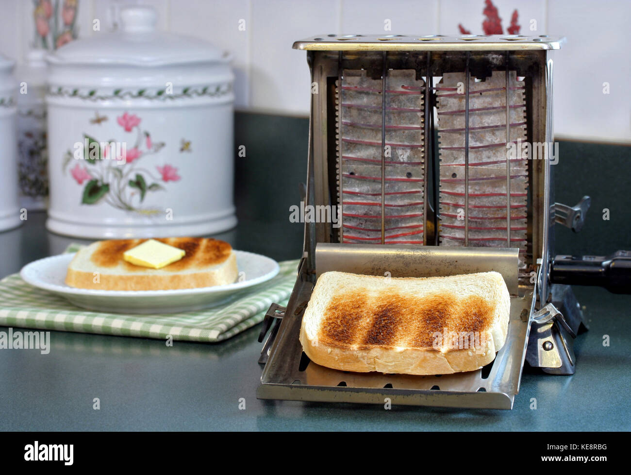 An antique toaster, with toast, on a kitchen counter Stock Photo Alamy