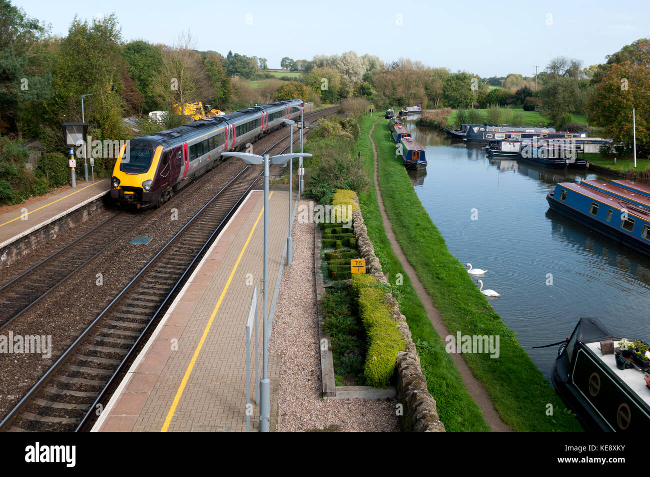 Arriva Cross Country Voyager train passing Heyford station and Lower Heyford Wharf, Oxfordshire, England, UK Stock Photo