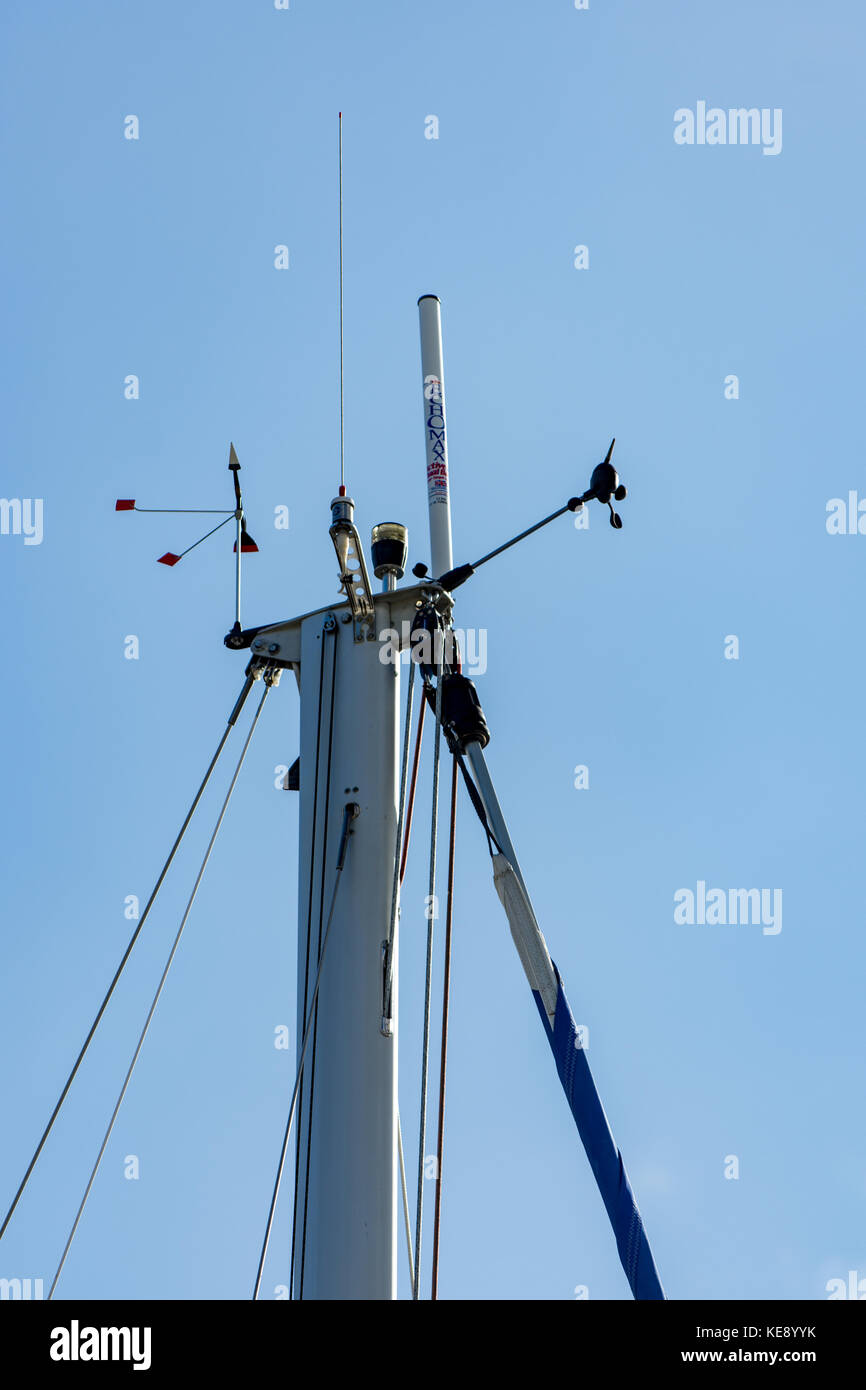 Masthead of sailing yacht showing communications and rigging Stock Photo