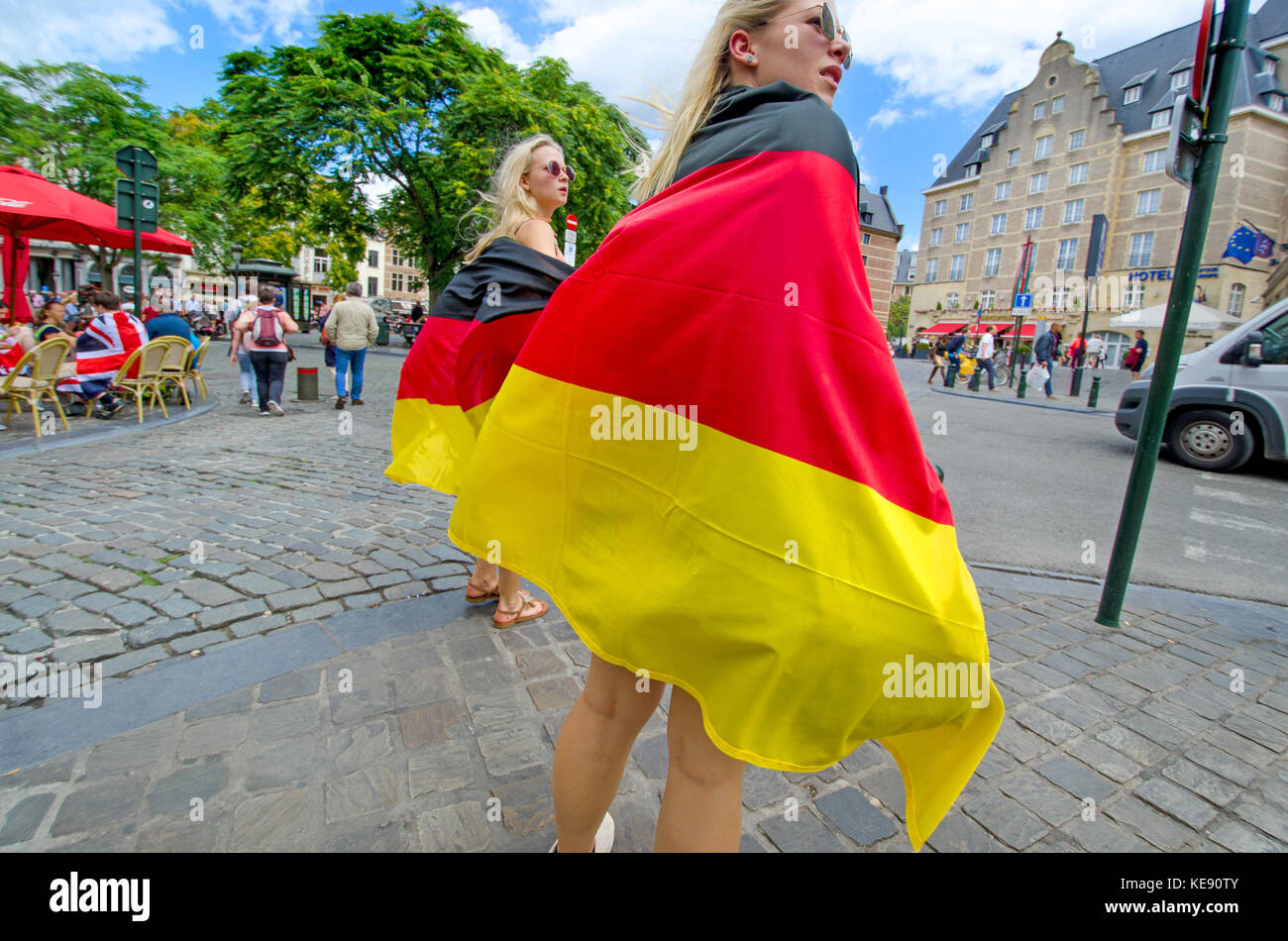 Brussels, Belgium. Girls wearing German flags Stock Photo