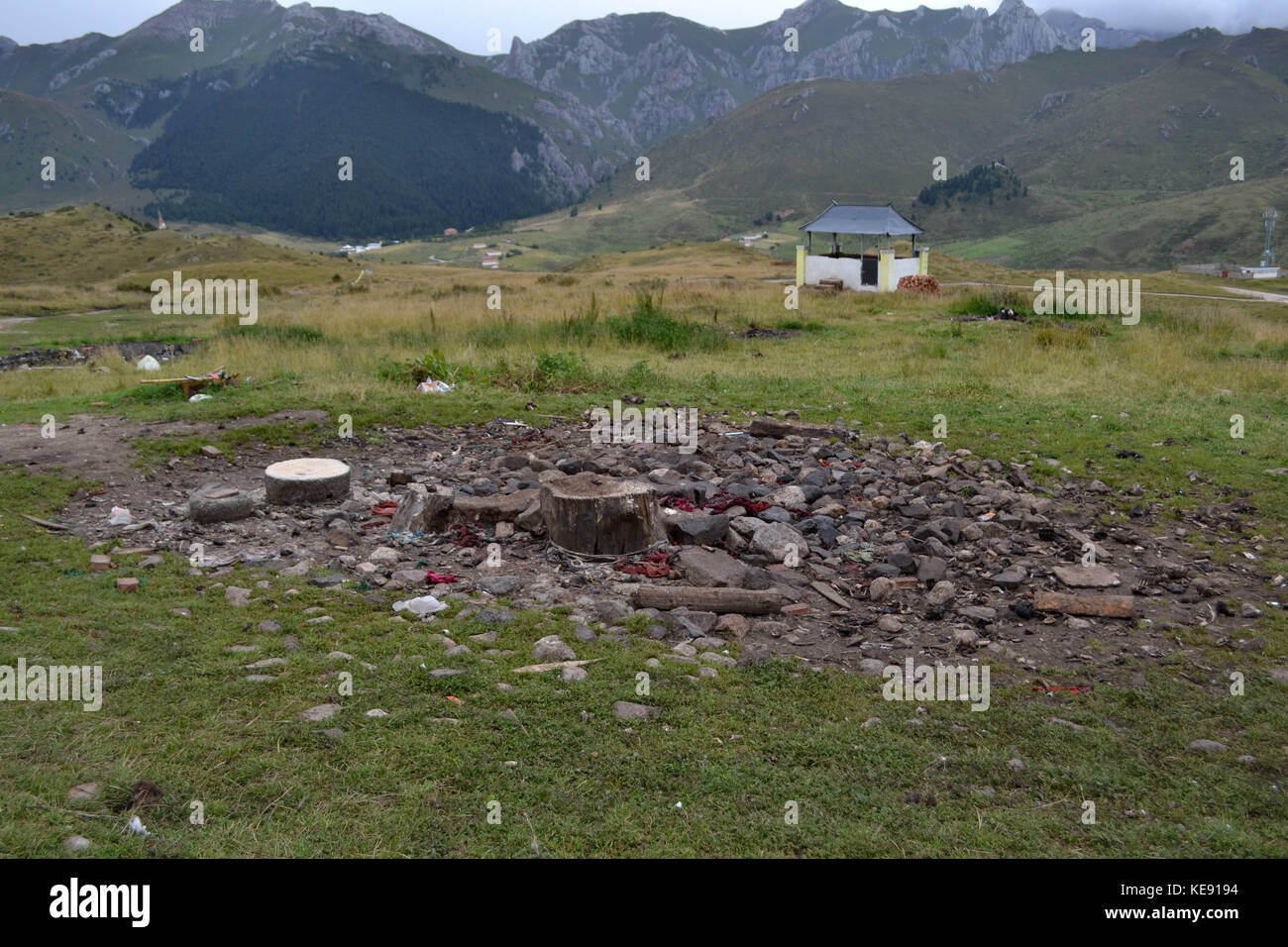 Beware, could be a disturbing picture. It's the sky burial of Tibetan culture. A funeral practice to place the human corpse on a mountaintop to decomp Stock Photo