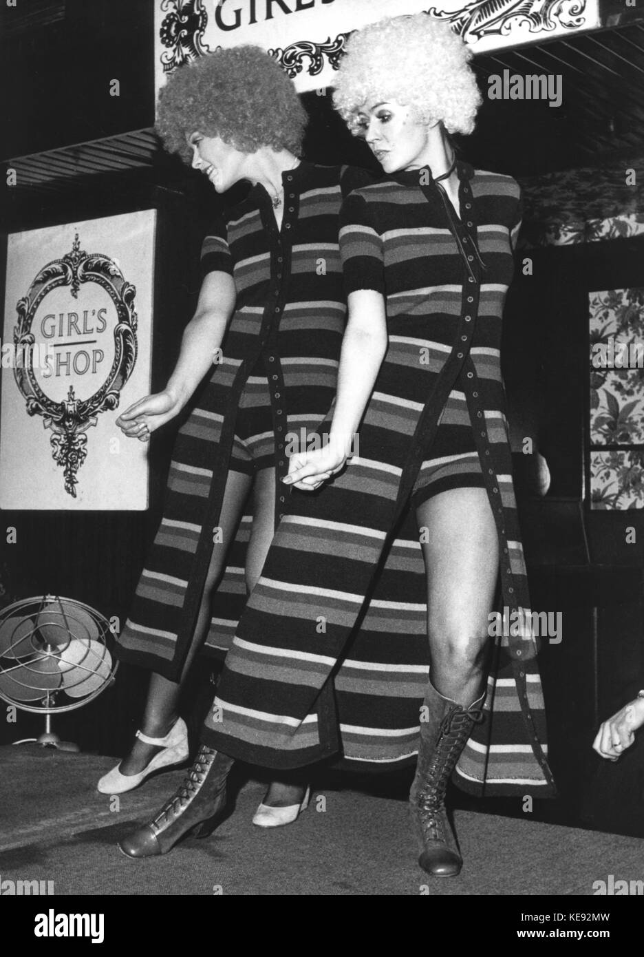 Two group members of "Take Five Dancing Mannequin Group" are performing