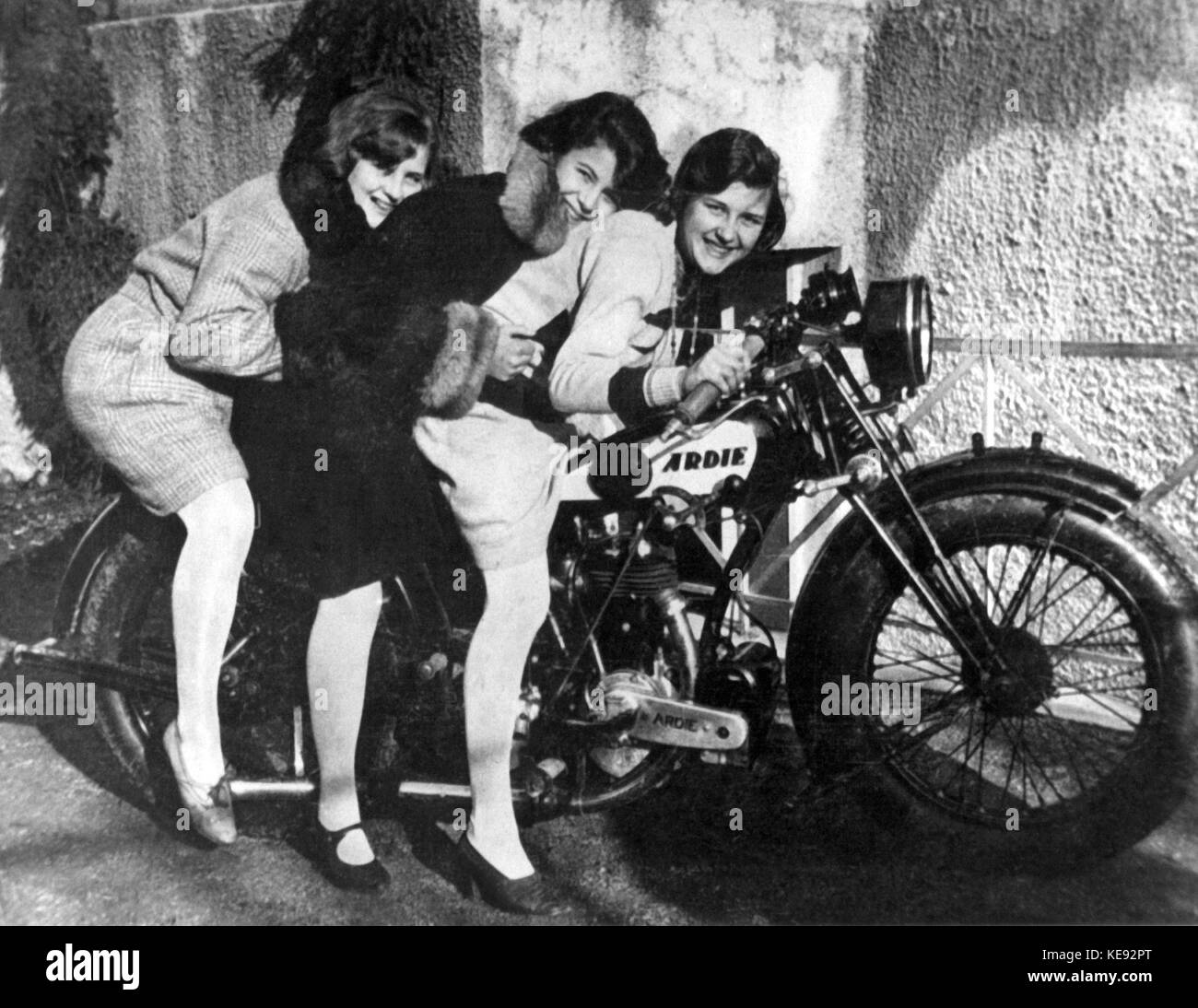 Hitler's life companion Eva Braun (l) poses with her sisters Inge and Herta on a motorbike. Undated  | usage worldwide Stock Photo