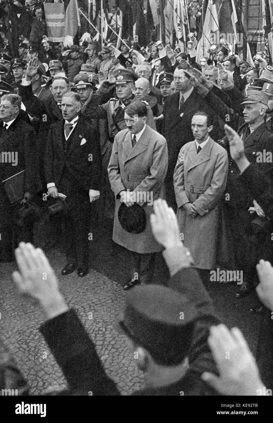 Adolf Hitler (m) with members of the Reich government during the rally of the youth on 1 May 1933 at Berlin Lustgarten. On the right, Propaganda Minister Joseph Goebbels. The 'Tag der Arbeit' (Labor Day) was declared as the 'Feiertag der nationalen Arbeit' (holiday of national labor) on instruction of the Reich government in 1933. | usage worldwide Stock Photo