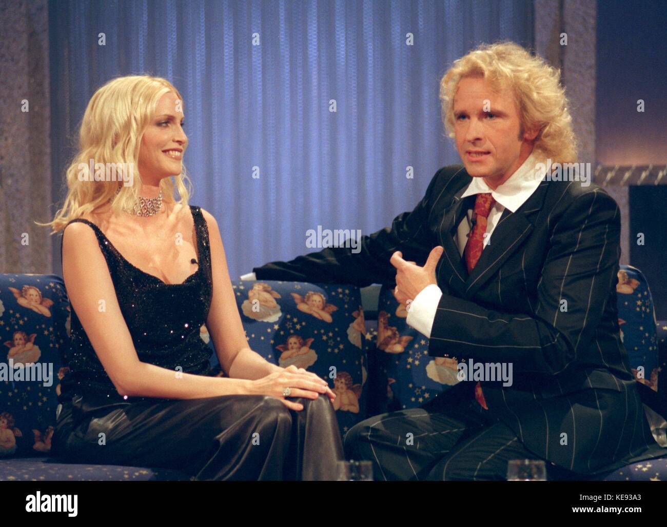 German television host Thomas Gottschalk talks to model Nadja Auermann live on a television show on 11 December 1999 in Boeblingen (Baden-Wurttemberg, Germany).  | usage worldwide Stock Photo