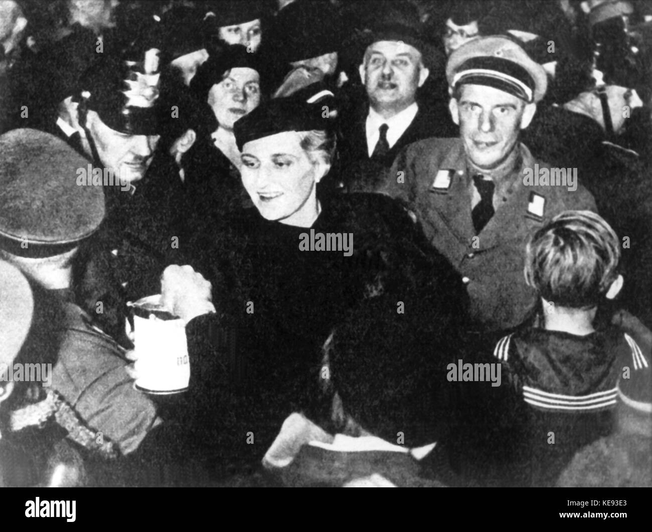 Wife of Reich Propaganda Minister Joseph Goebbels, Magda Goebbles, collects for the Winter Relief Organization on Potsdamer Platz in Berlin, 1934. | usage worldwide Stock Photo