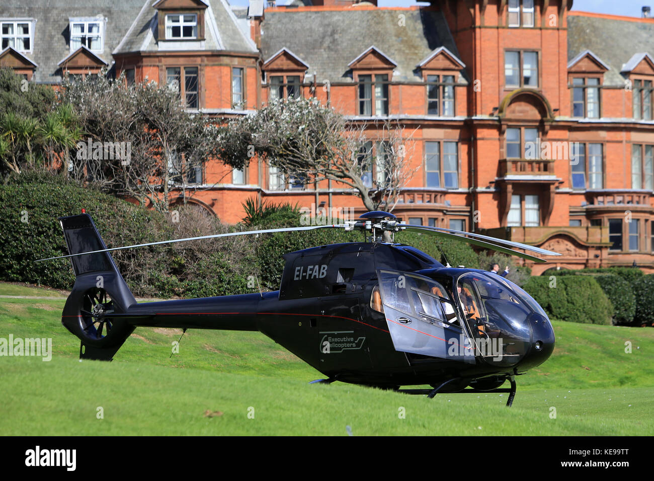 Executive private helicopters land at the Slieve Donard Hotel which ...
