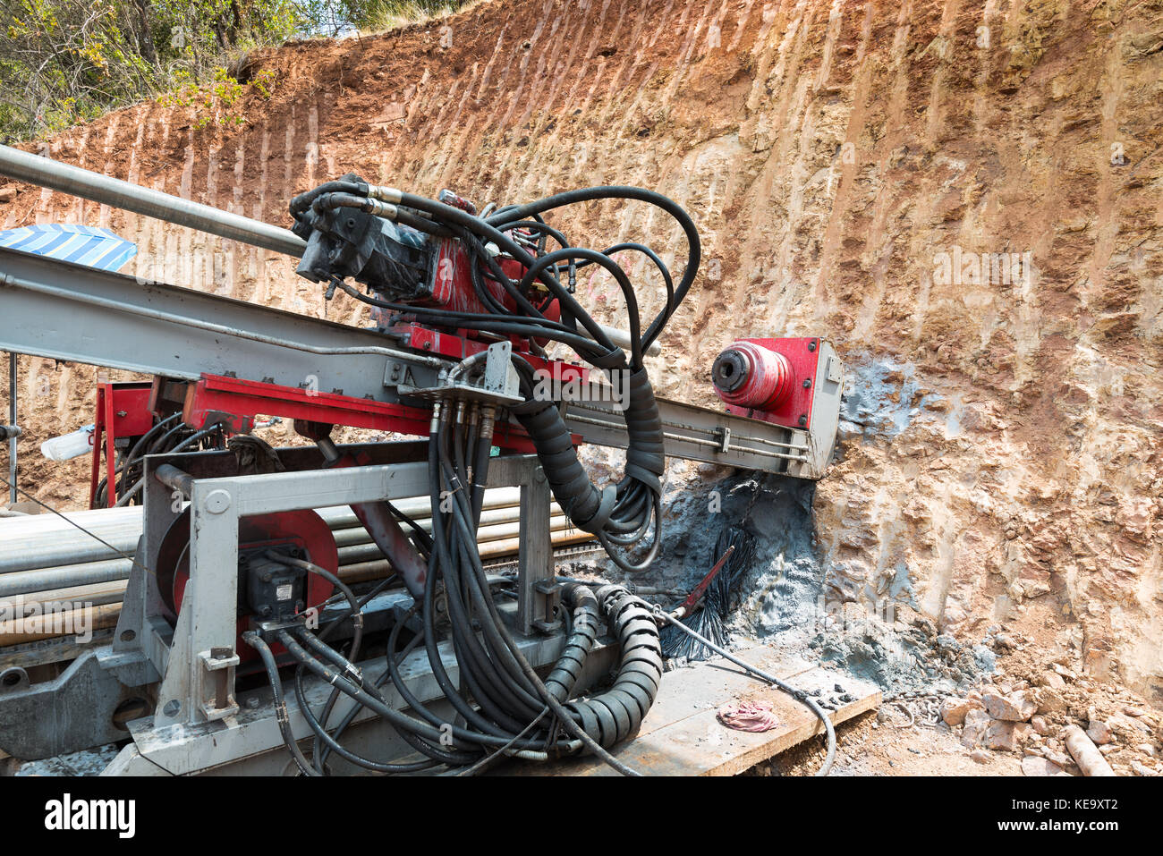 Ore drilling machine at work in a gold mine Stock Photo