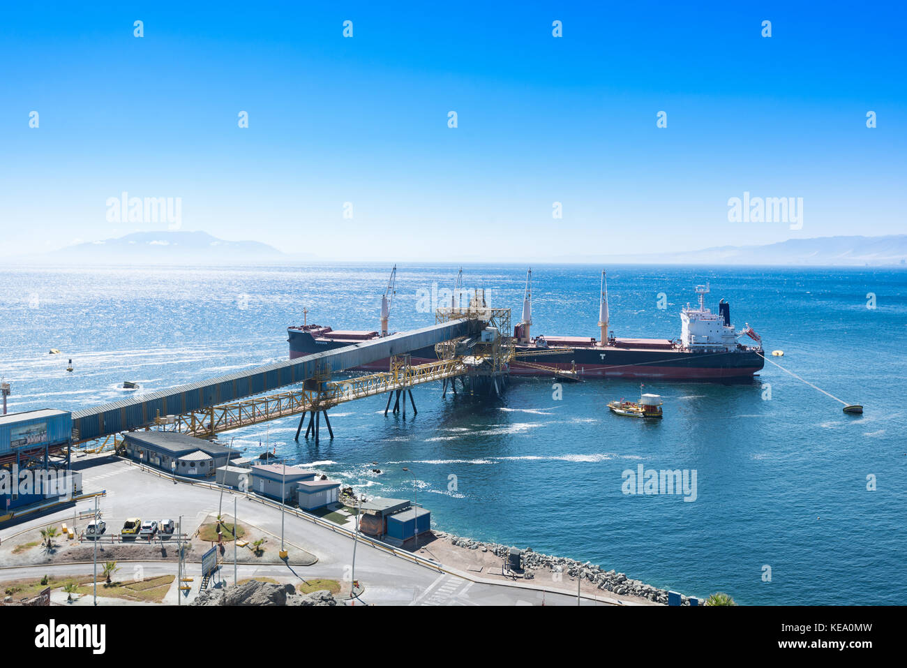 Antofagasta, Antofagasta Region, Chile - Cargo ship docked at Puerto Coloso, an alternative port from the port of Antofagasta, serving Stock Photo