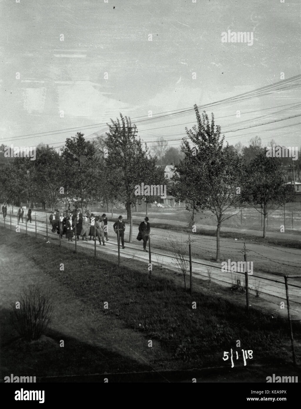 Wagner Electric Company strike; group of men and women walking on