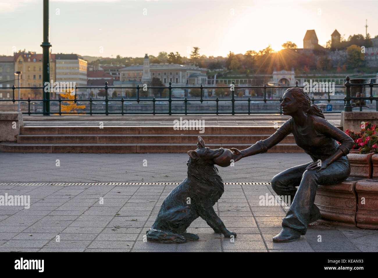 Girl With Her Dog Statue statue on the Riverside Promenade in Budapest