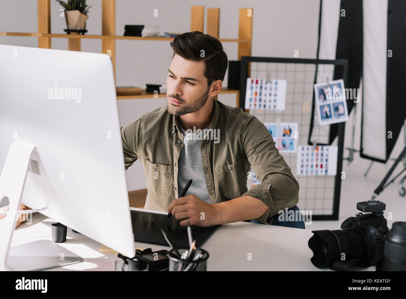 photographer working with graphics tablet Stock Photo Alamy