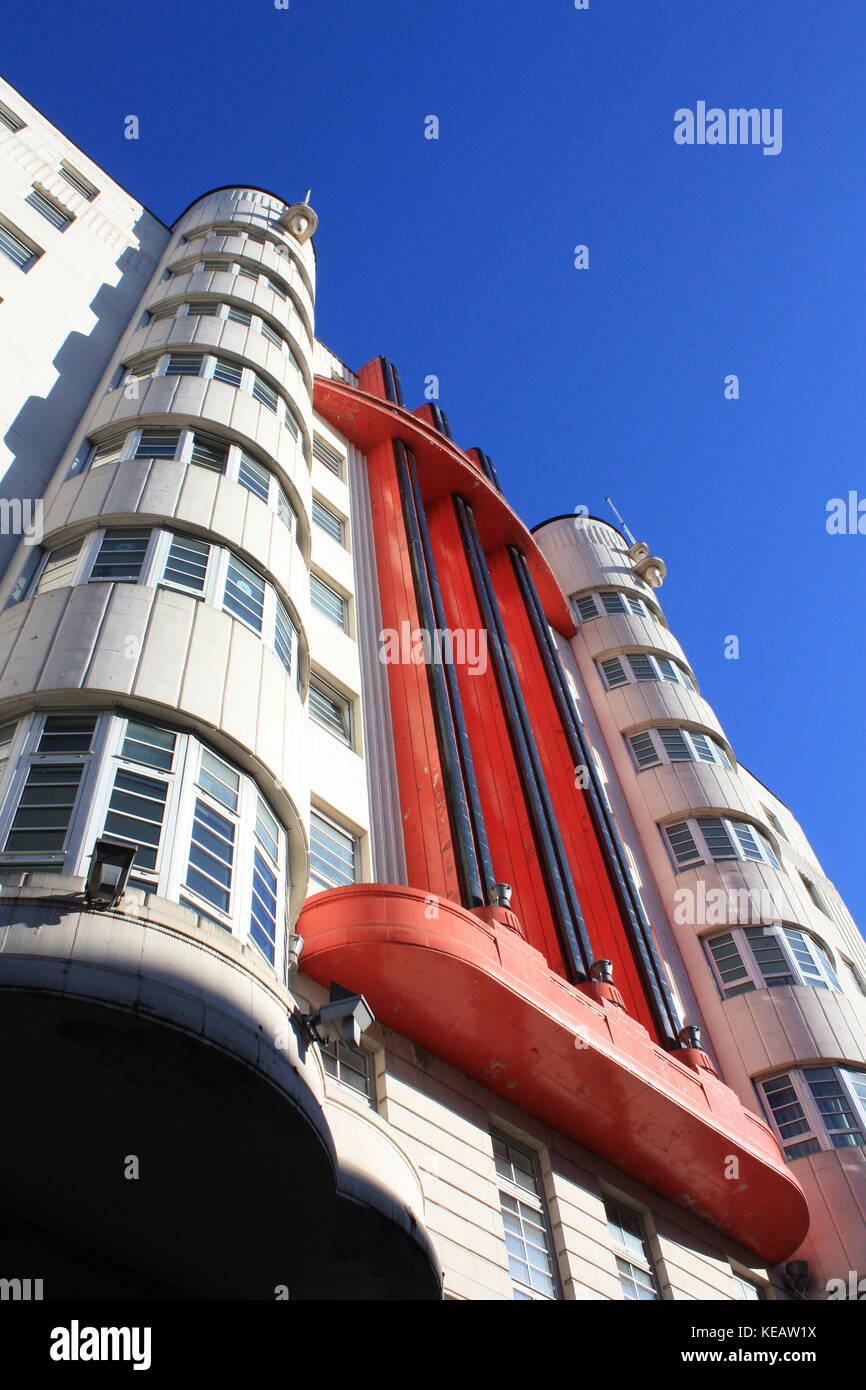 Beresford building - Sauchiehall street Glasgow - Glasgow Art Deco architecture. Red and white flats built in the 1930's with blue sky background Stock Photo