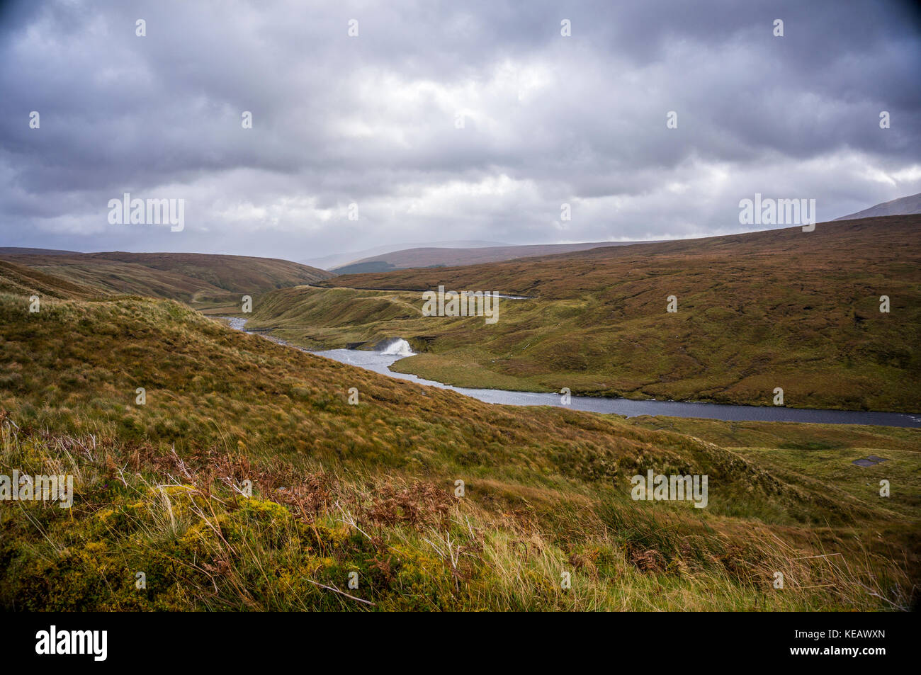 Water feeding into the reservoir for the hydro-electric dam and small power station on the River Cassley, Sutherland, Scottish Highlands, UK Stock Photo