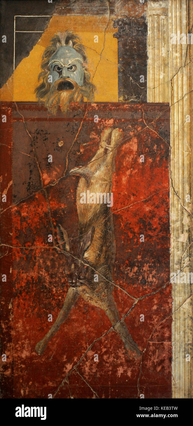 Roman fresco depicting a hare and the mask of a Satyr. Cubiculum. North wall. Pompeian House VI. 1st century BC. National Archaeological Museum. Naples. Italy. Stock Photo