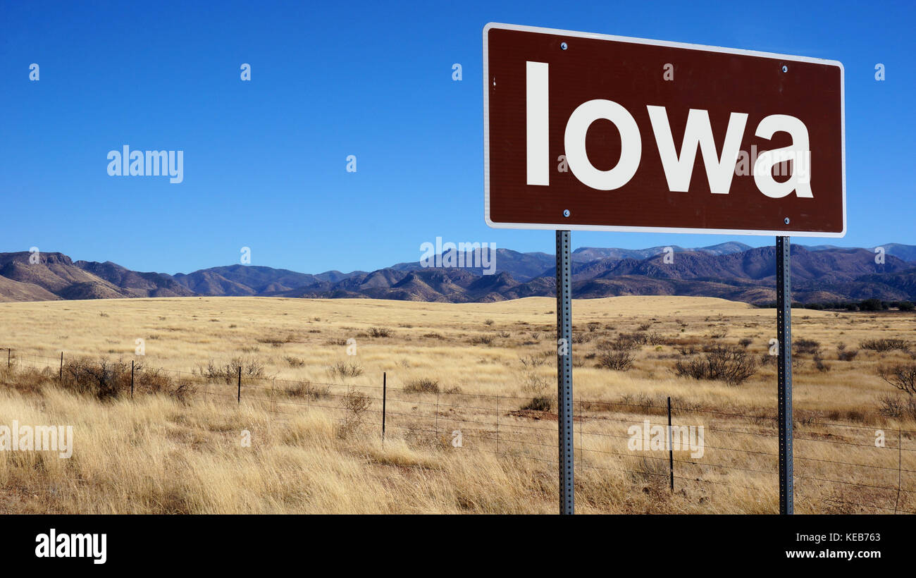 Iowa Road Signs Examples Iowa road sign with blue sky and wilderness Stock Photo - Alamy