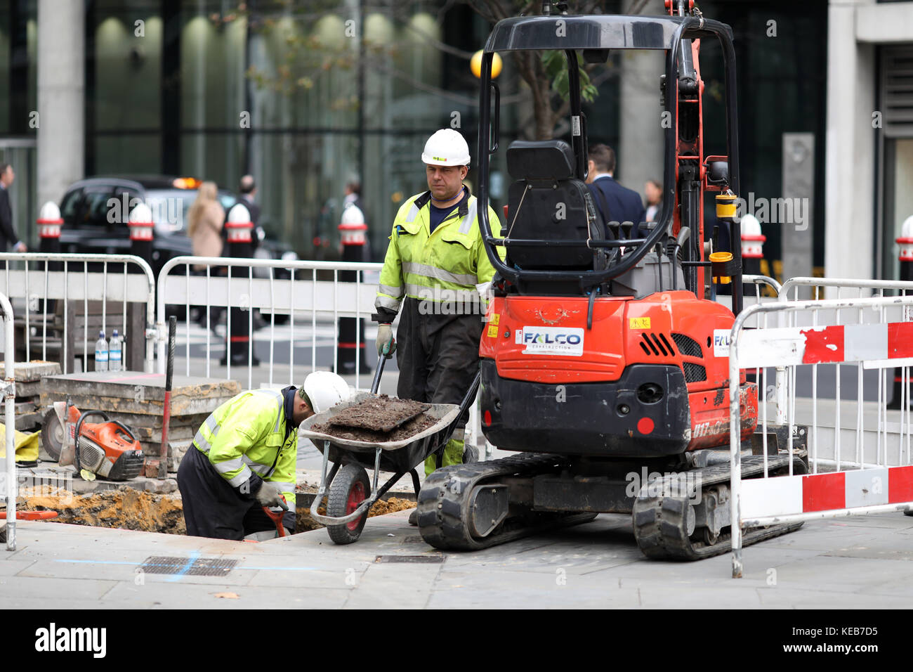 workers digging up road for electricity Stock Photo Alamy