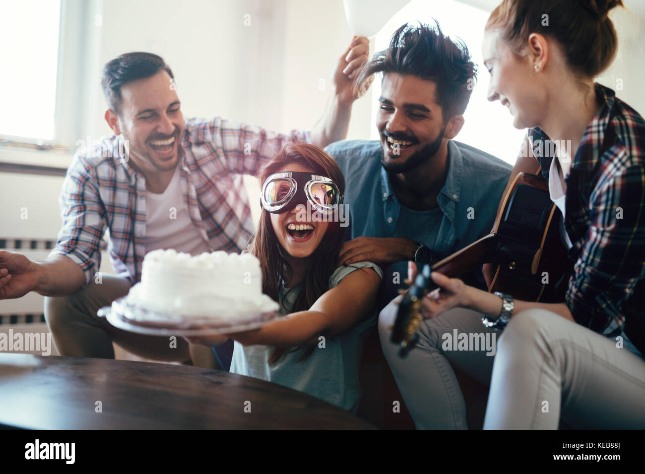 Group young friends balloons hi-res stock photography and images - Alamy