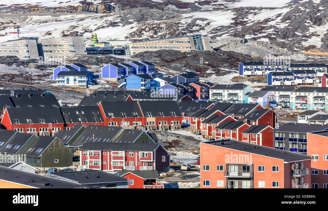 Greenlandic colorful houses standing on the rocky hills, Nuuk city