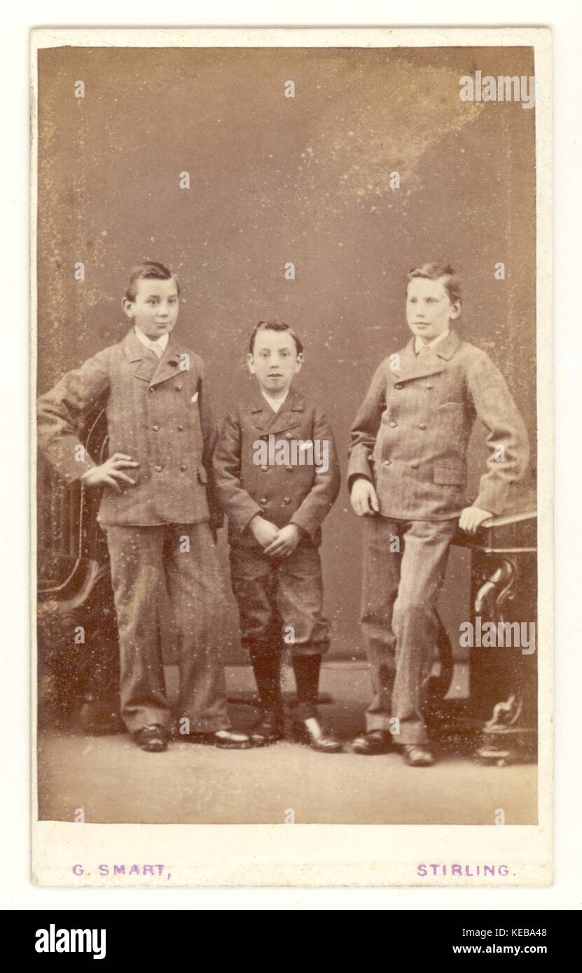 Original sepia toned Victorian Carte de Visite (CDV) portrait of 3 boys, possibly brothers 1860s, Stirling, Scotland U.K Stock Photo