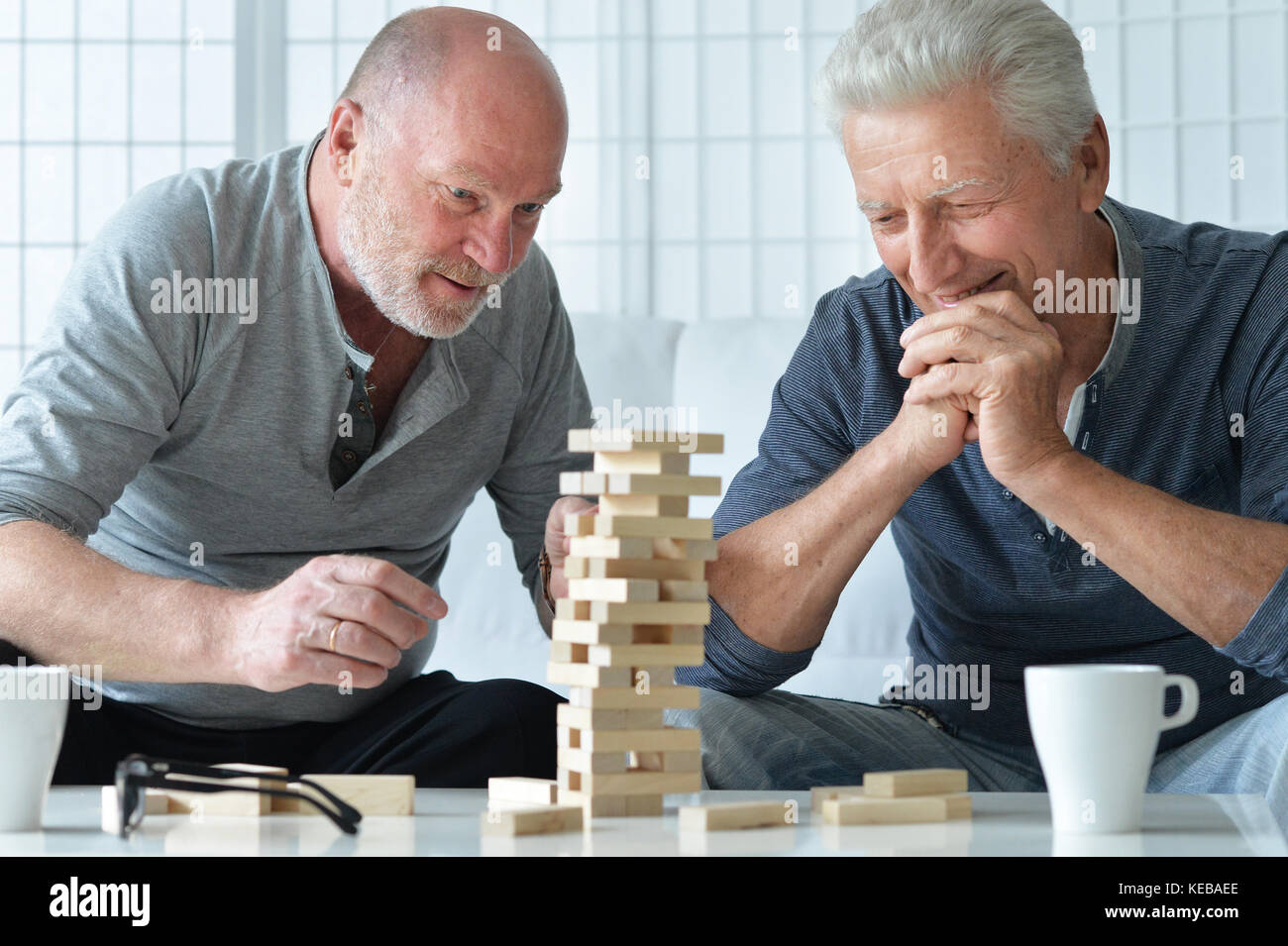 senior men playing  board game Stock Photo