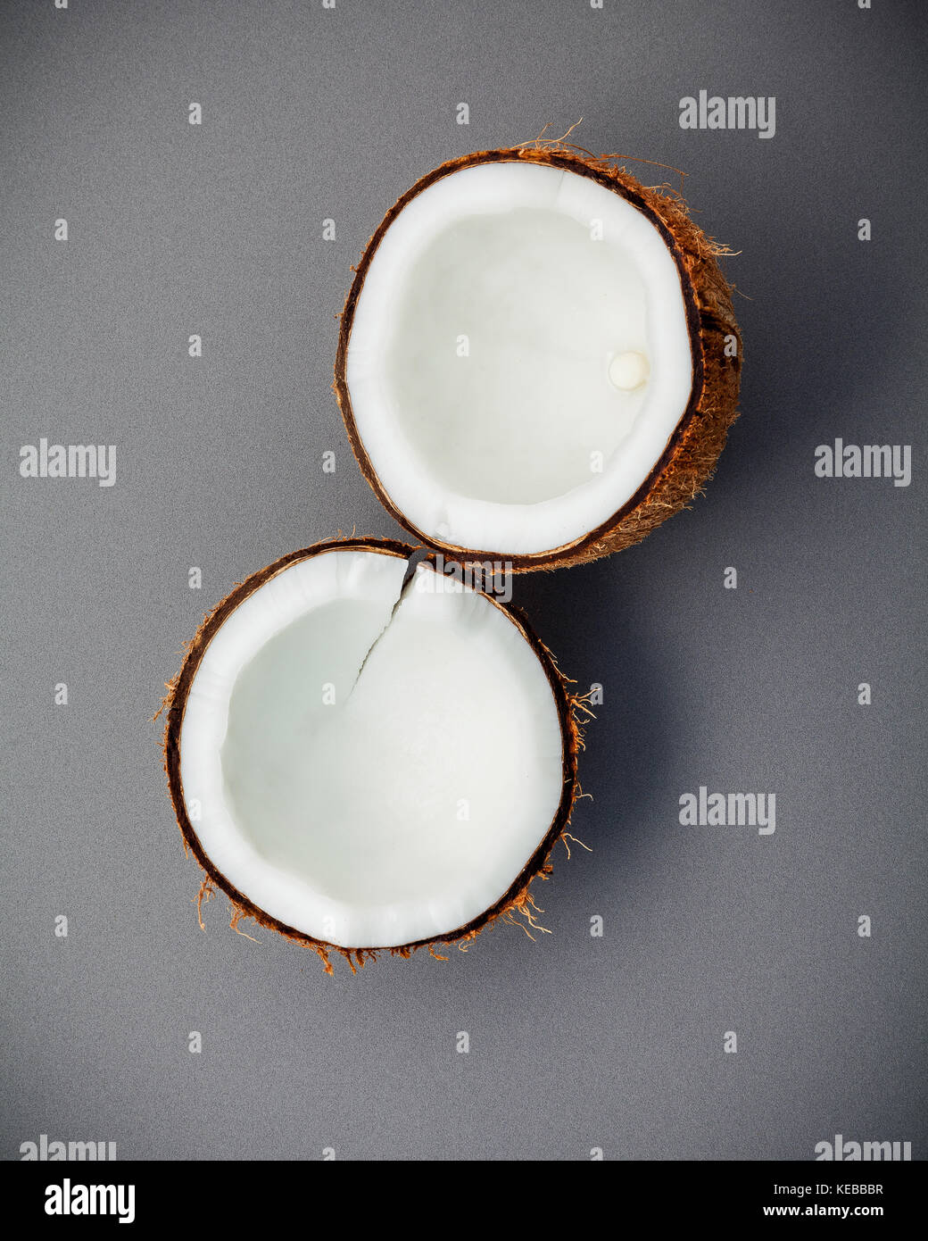 Whole of coconut shell on gray background flat lay and copy space. top ...