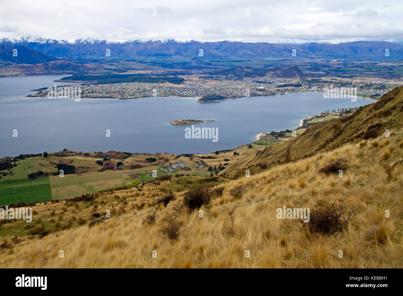 View over Lake Wanaka from the slopes of Roys Peak Stock Photo