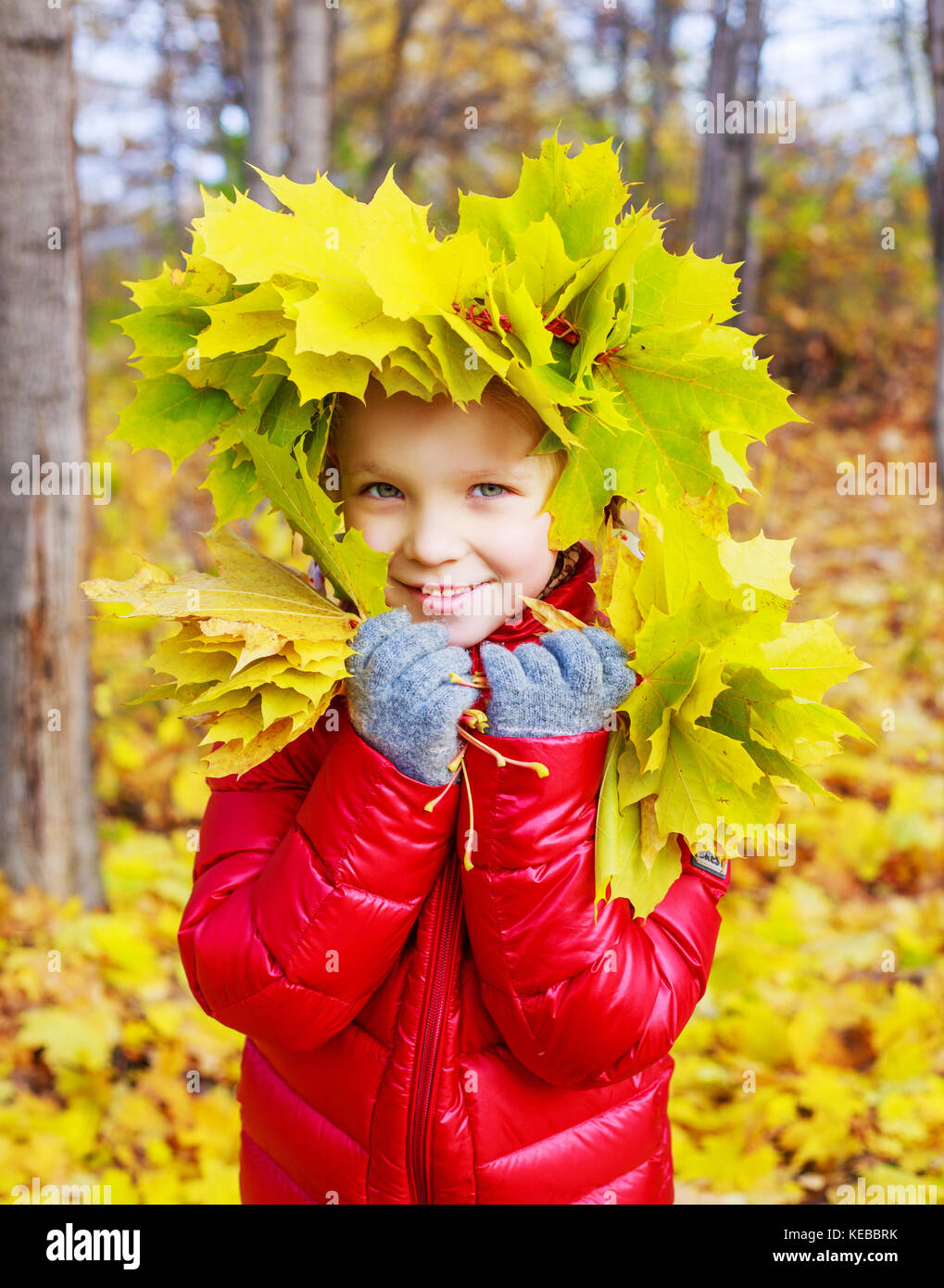 happy little girl in the autumn park Stock Photo - Alamy
