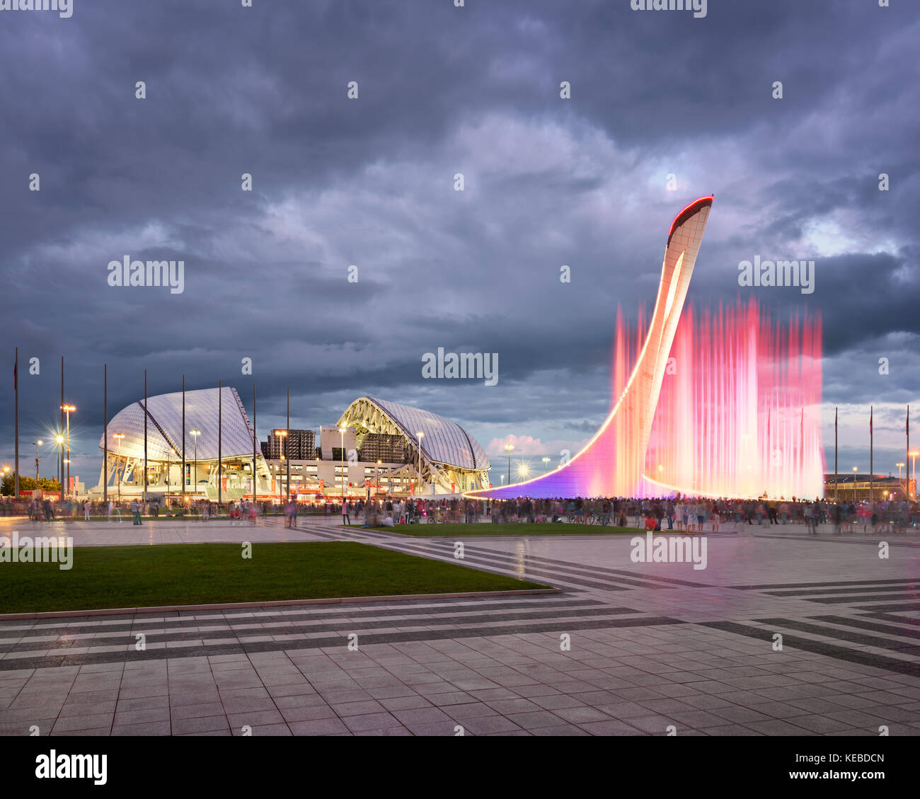 SOCHI, RUSSIA - JUNE 20, 2017: Music Fountain and Olympic Stadium Fisht in the Evening, Sochi, Russia. Named after Mount Fisht, the 40,000-capacity st Stock Photo