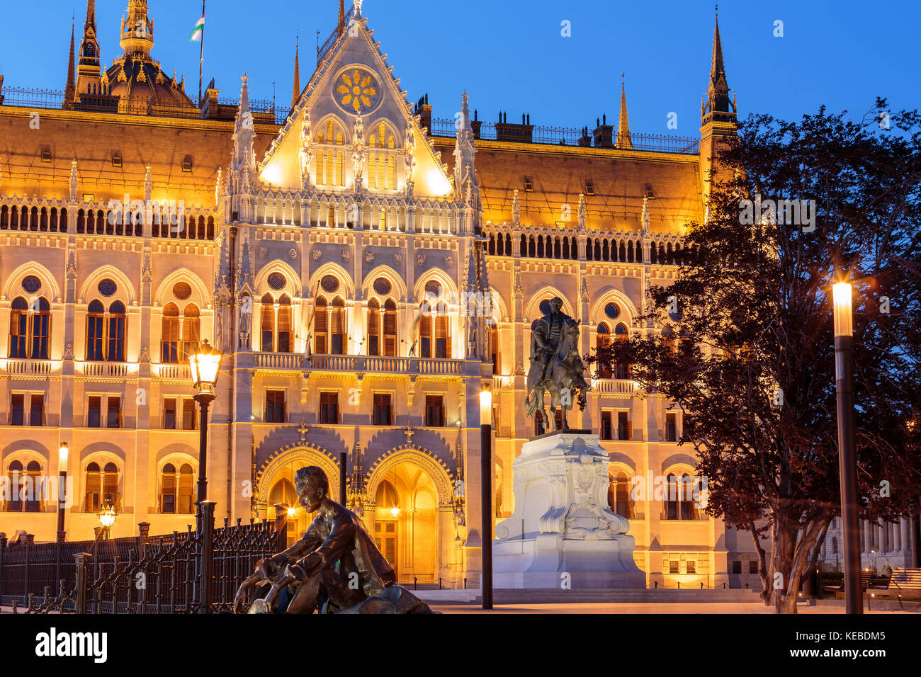 Statue of Jozsef Attile and equestrian statue of Count Gyula Andrassy on Kossuth Square near the Parliament in Budapest, Hungary Stock Photo