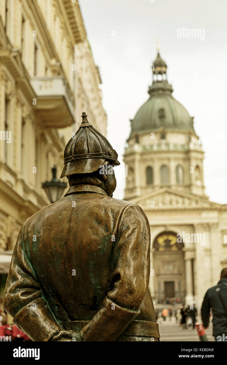 Fat policeman statue on Zrinyi Street in Budapest, Hungary Stock Photo