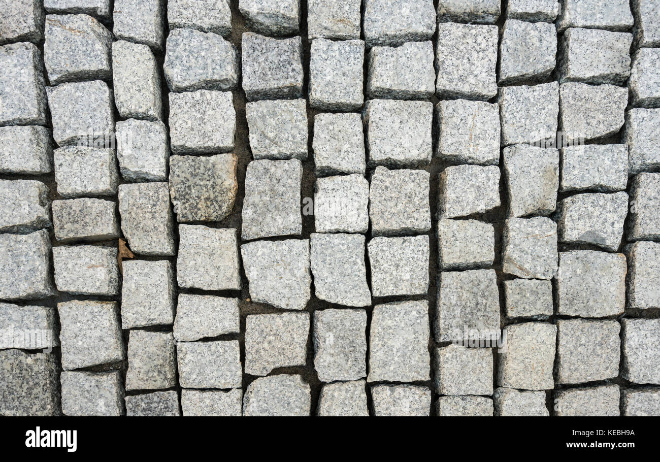 New construction of granite cobblestone path Stock Photo