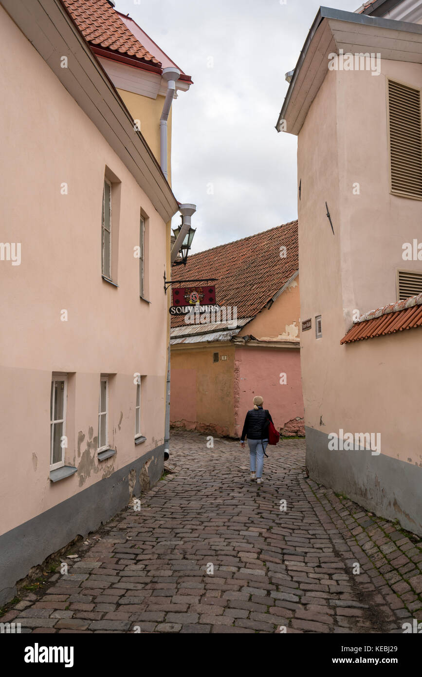 Solitary tourist in late September in Tallinn Stock Photo
