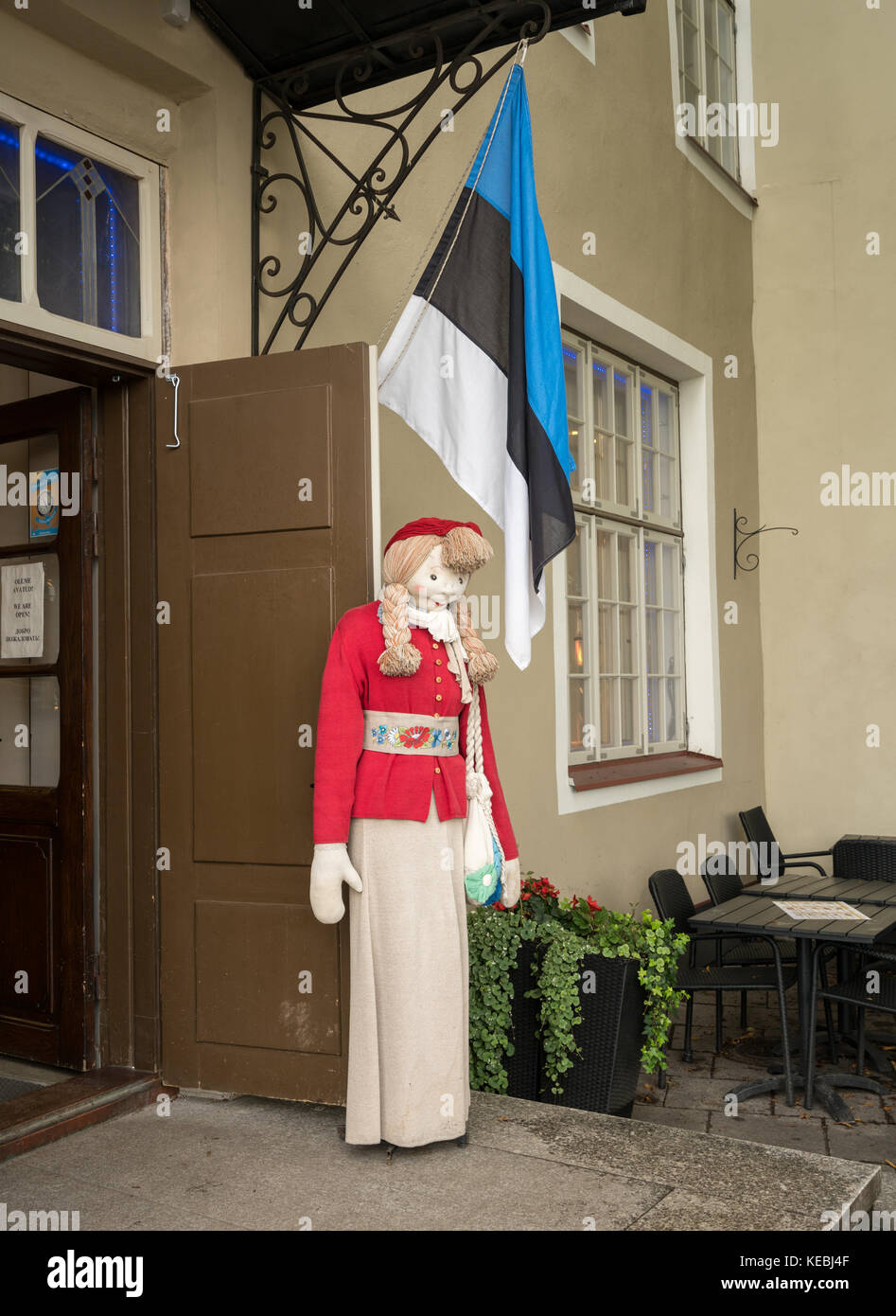 Stuffed doll in national costume outside souvenir store Stock Photo