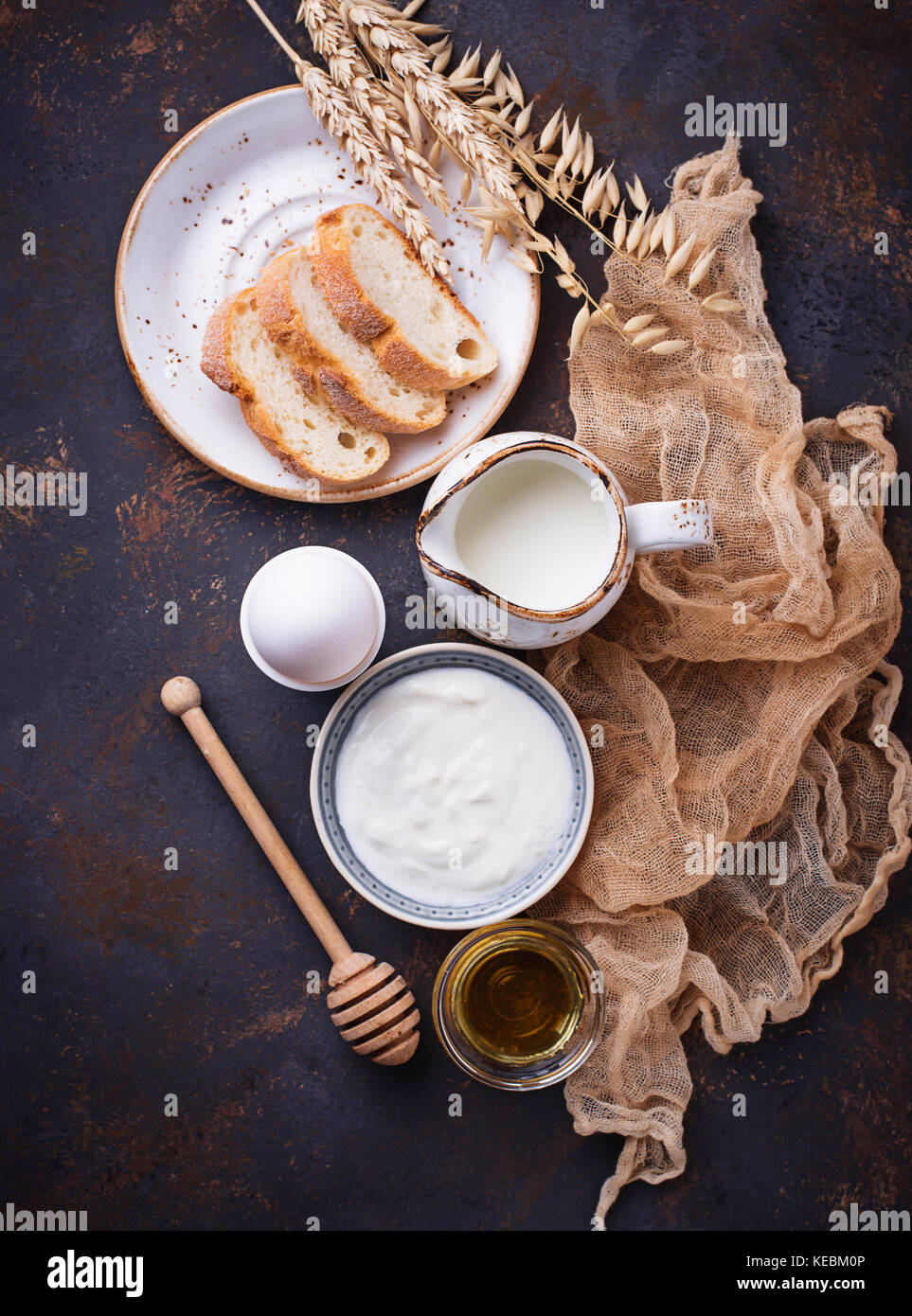Yogurt, boiled egg, milk and honey Stock Photo Alamy