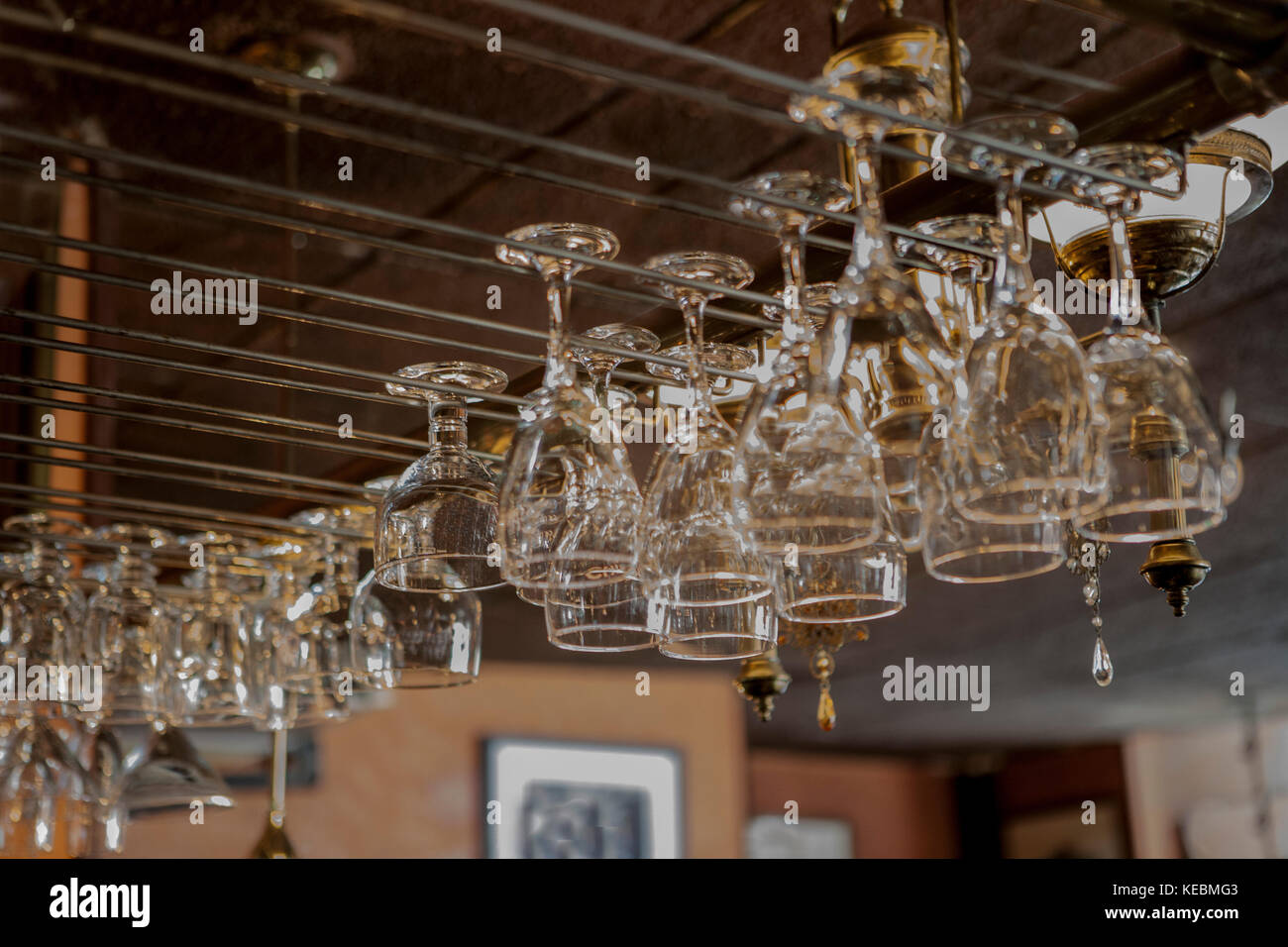 Bar Glasses Hanging from Rack Stock Photo Alamy
