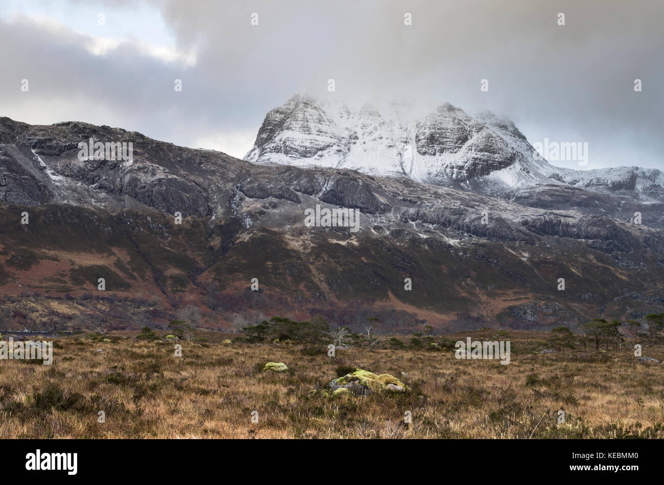 Slioch Mountain in Scotland dusted in snow in winter,Wester Ross, Scottish Highlands on the North Coast 500 route Stock Photo