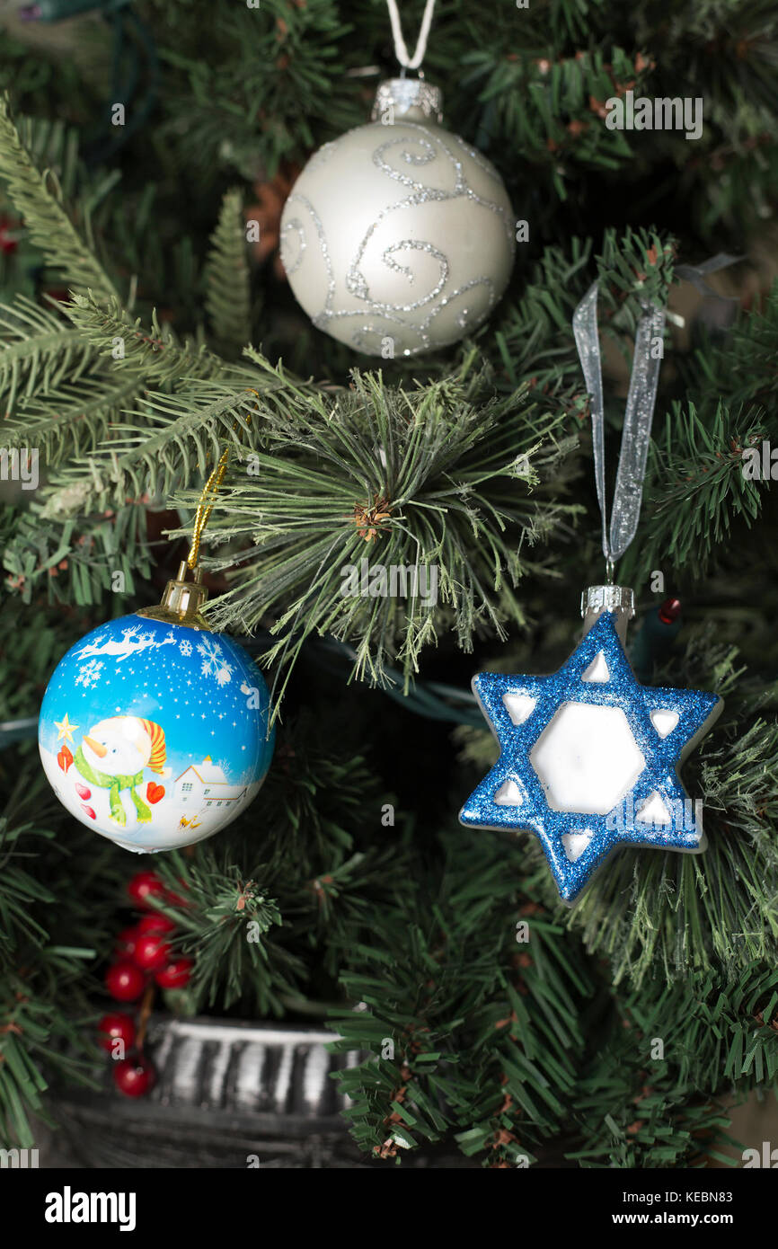 Hanukkah and Christmas decorations on tree Stock Photo