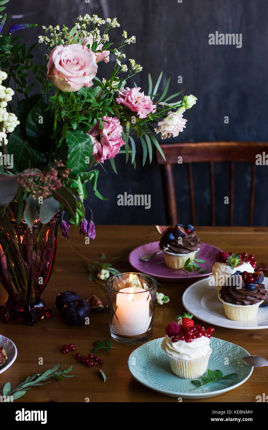 The beautiful rustic bouquet of flowers on festive table Stock Photo ...