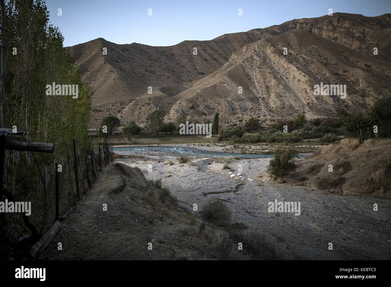 Beshkent, Kyrgyzstan. 11th Oct, 2016. Village of Lyaily near Beshkent, Kyrgyzstan, where nearly all 300 families use water from the aryk, an irrigation canal. The water they drink is vulnerable to contamination from bacteria that cause hepatitis and other water-borne illnesses. The locals are hoping and planning for infrastructure project to bring clean water to their homes. In villages across Kyrgyzstan (Central Asia) antiquated water delivery systems and infrastructure is the cause of health issues such as outbreaks of hepatitis and gastrointestinal disease, especially among children. ( Stock Photo