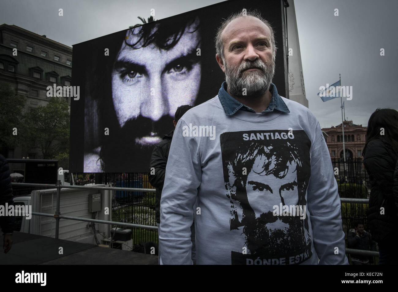 Federal Capital, Buenos Aires, Argentina. 16th Sep, 2017. A demonstrator is seen gathering to protest against the disappearance of Santiago Maldonado since 1 August 2017 while wearing a clothes with the photo of Santiago Maldonado.Despite the rain, thousands of protesters gathered on Sunday in Plaza de Mayo hosted by the relatives and friends of Santiago Maldonado two months after his disappearance, after he was reportedly surrendering to Argentinian police guards during a raid on a camp of Mapuche protesters in Patagonia, south of Argentina. Various protests were seen in several other Stock Photo