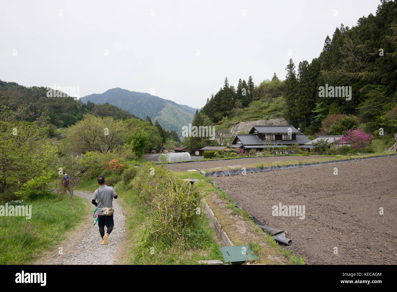 Japanese man running in Japan Stock Photo