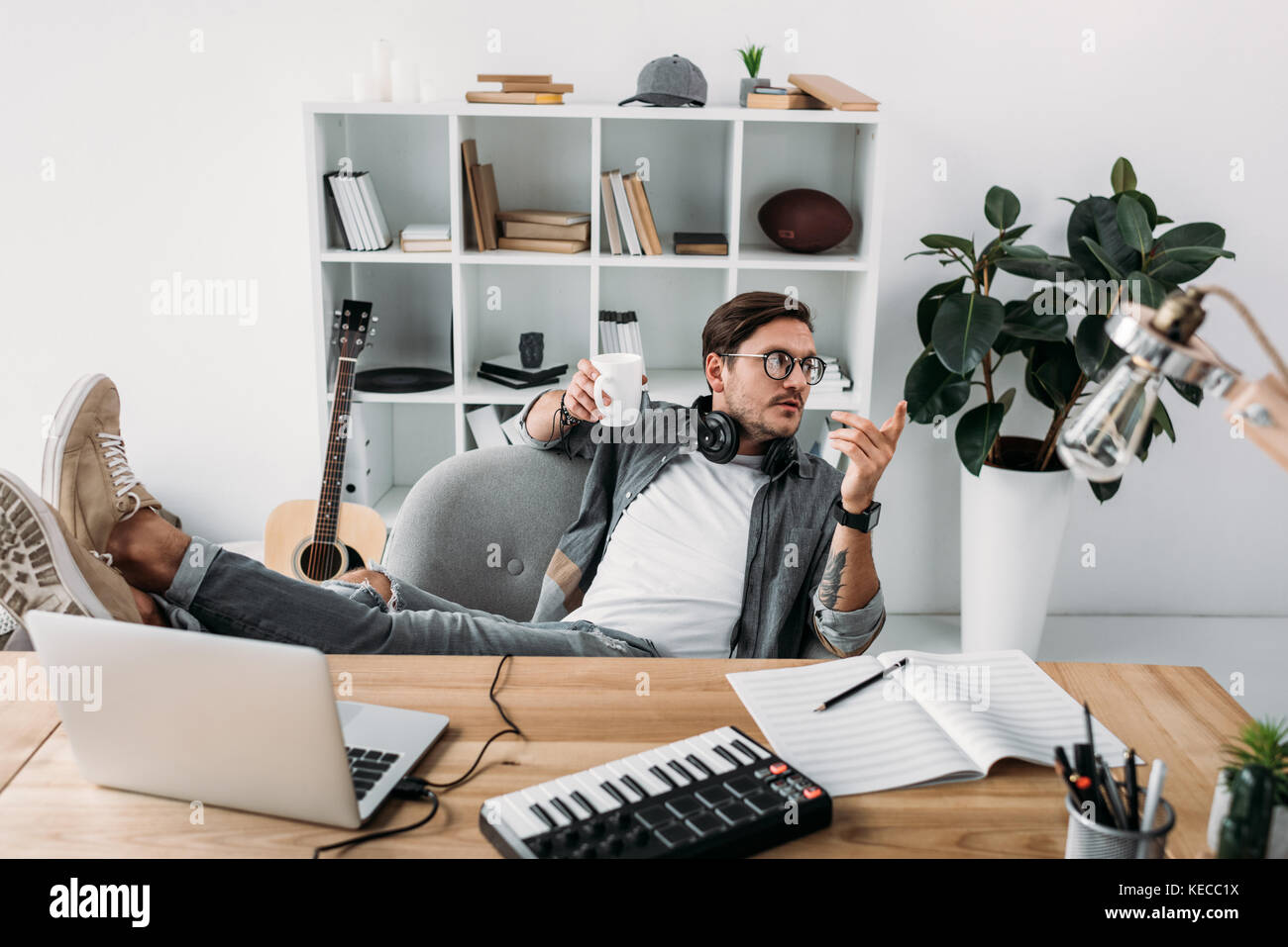 Cup coffee keyboard headphones hi-res stock photography and images - Alamy