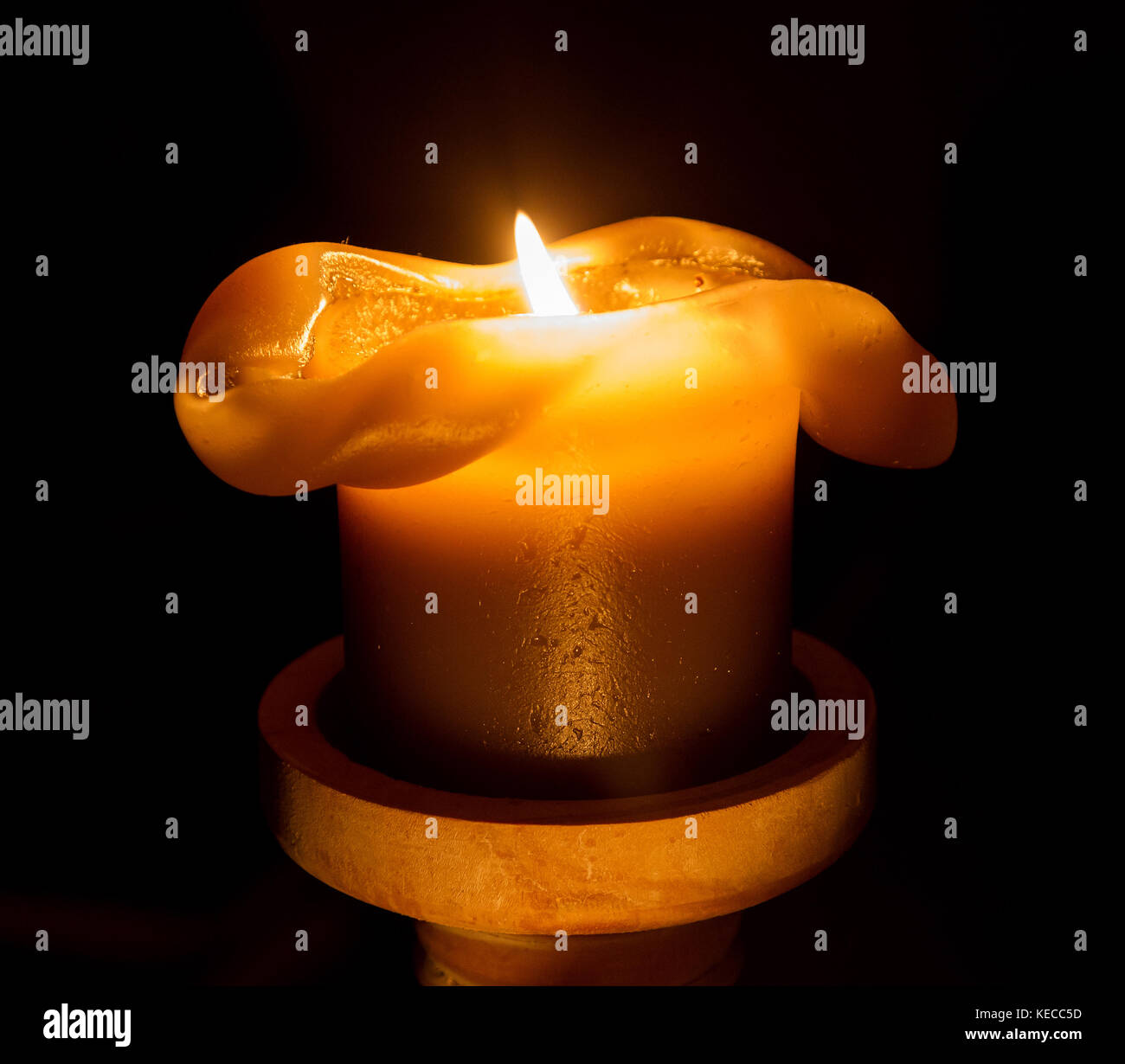Large candle burning in the darkness, selective focus Stock Photo Alamy